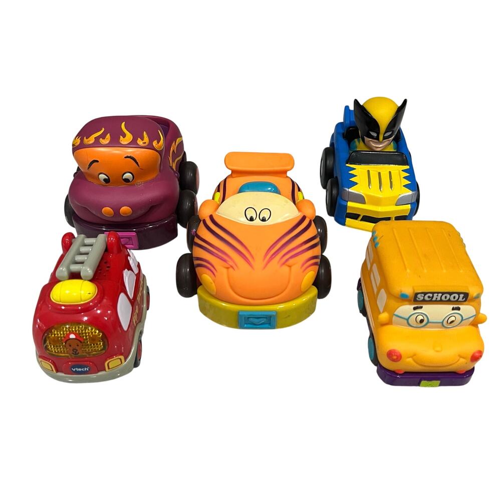 B. Toys Wheeee-ls! Pull Back Bus, Tiger & Truck ~ V-Tech Fire Truck & Wolverine